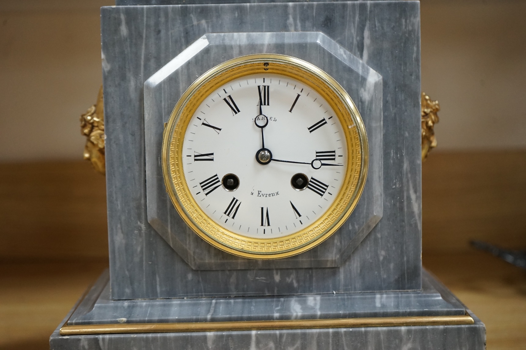 A French gilt metal mounted grey marble mantel clock, late 19th century, 35cm